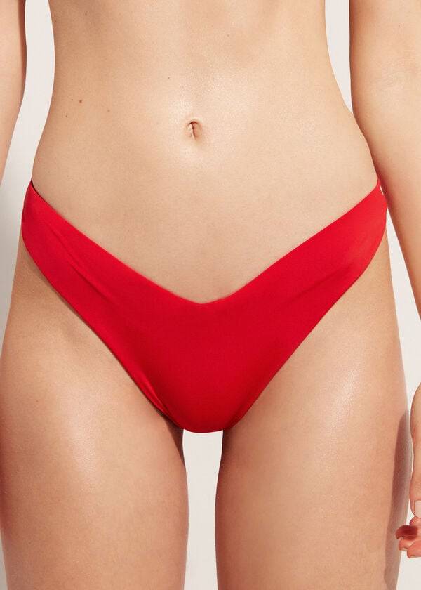 rote damen-bikinihose calzedonia mit hohem beinausschnitt aus brasilianischem und indonesischem Öko-material