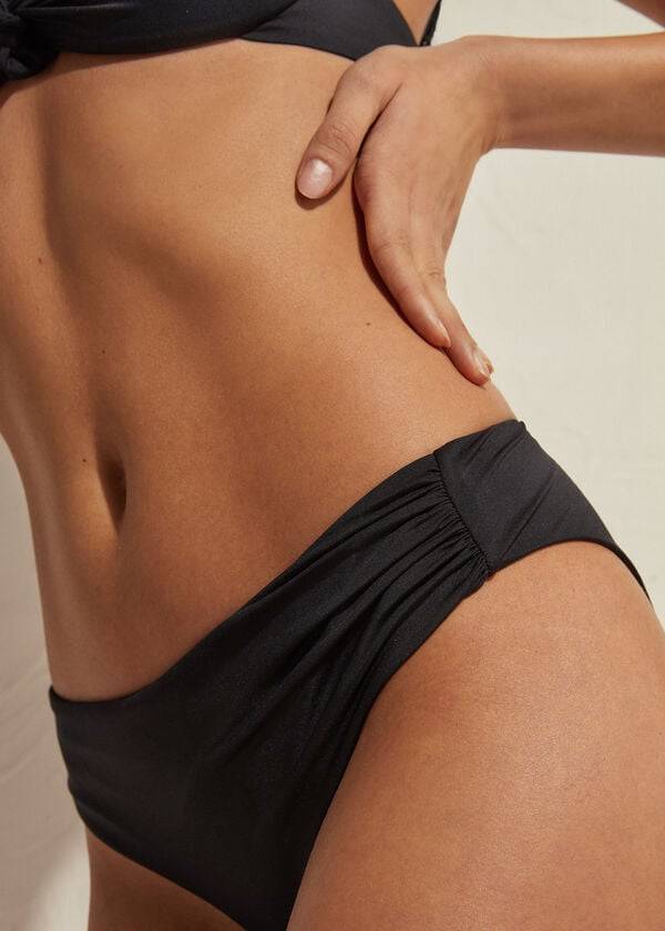 schwarze damen-bikinihose von calzedonia mit hohem bund aus indonesischem Öko-material