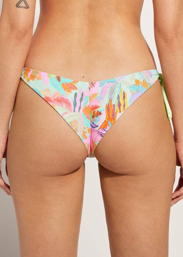 calzedonia bikinihose mit seitlichen bändern brasilianischem blattwerkmuster tahiti-design grün